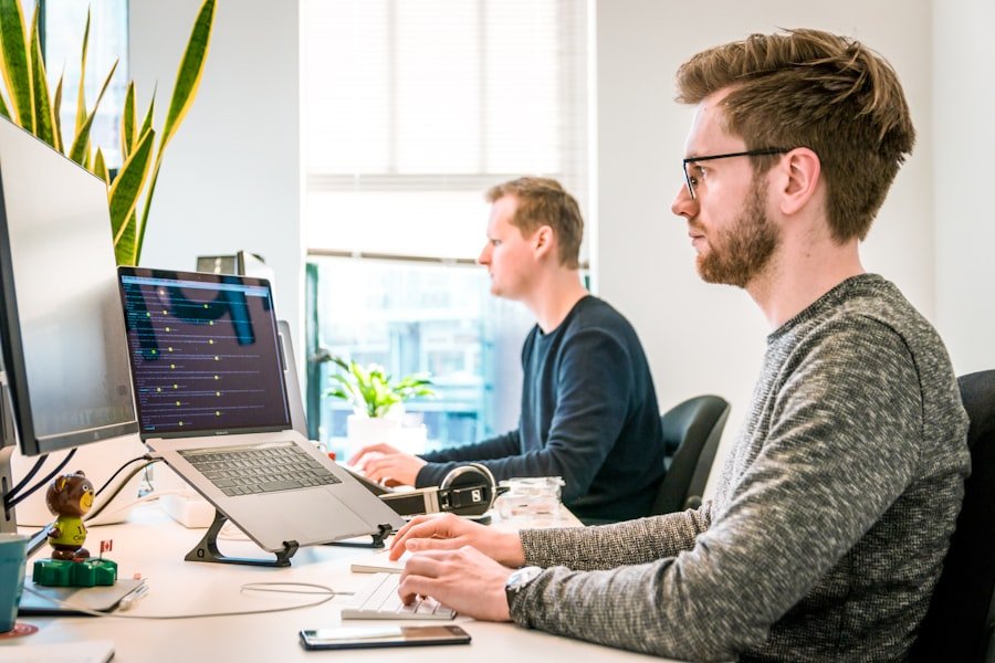 A marketer working at a desk on social content