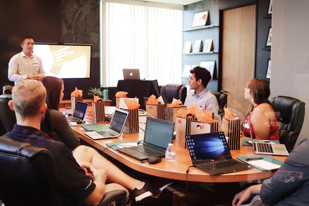 A strategist presenting campaign results to a client team