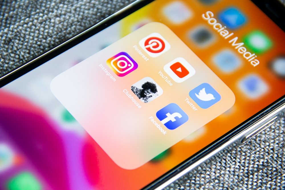 A phone screen showing a folder of social media apps